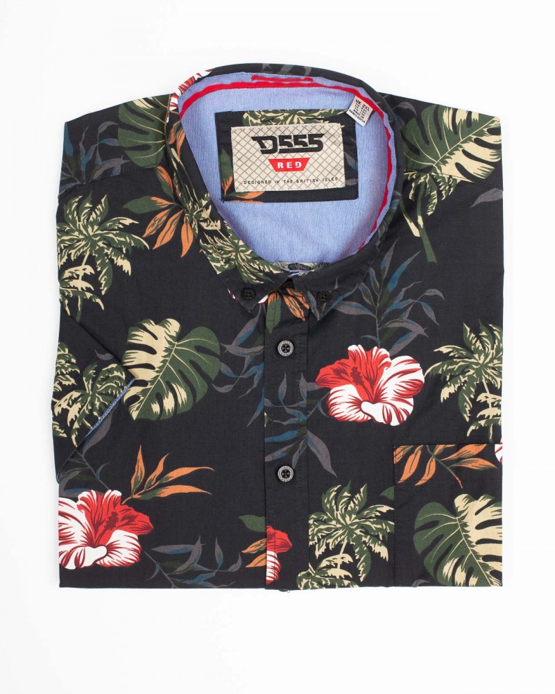 Vue De Chemises Hawaïennes Empilées Dans Des Bagages Avec Chapeau Et Casque