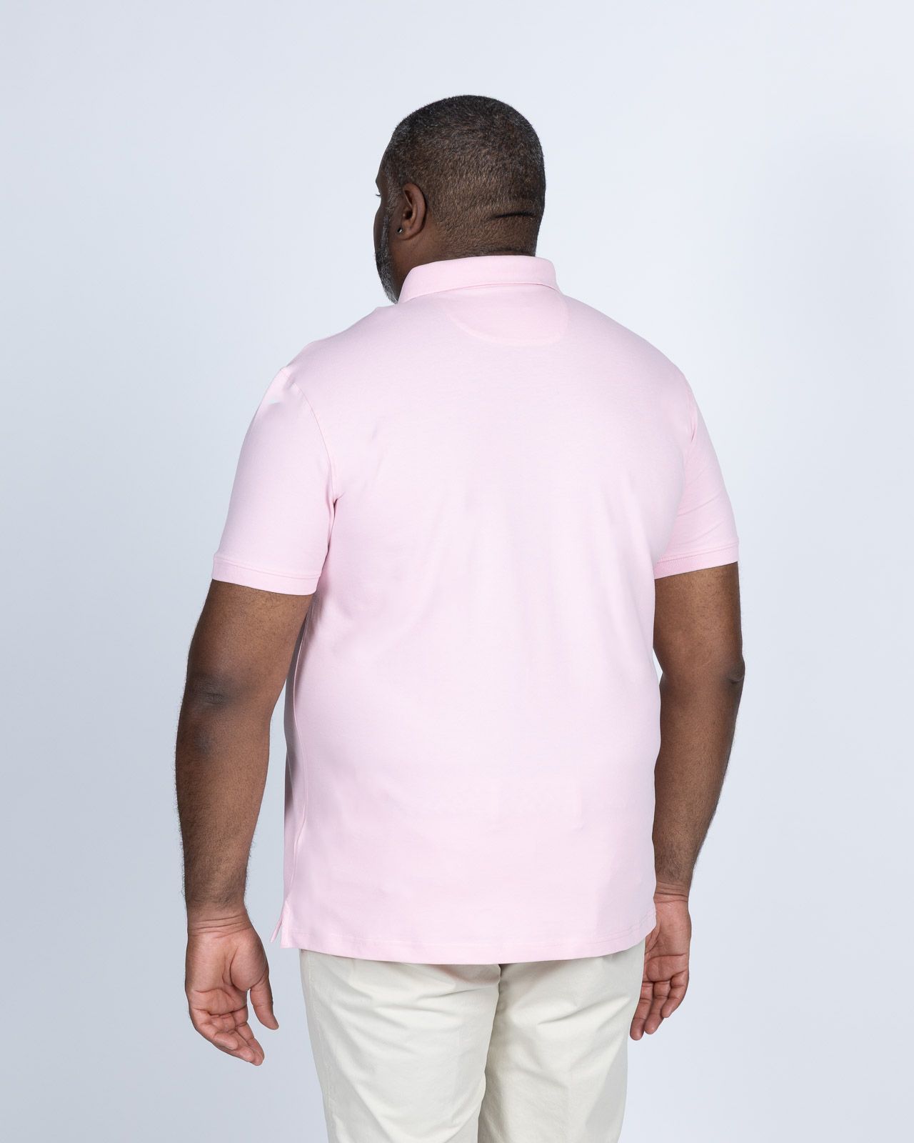 Polo uni grande taille rose