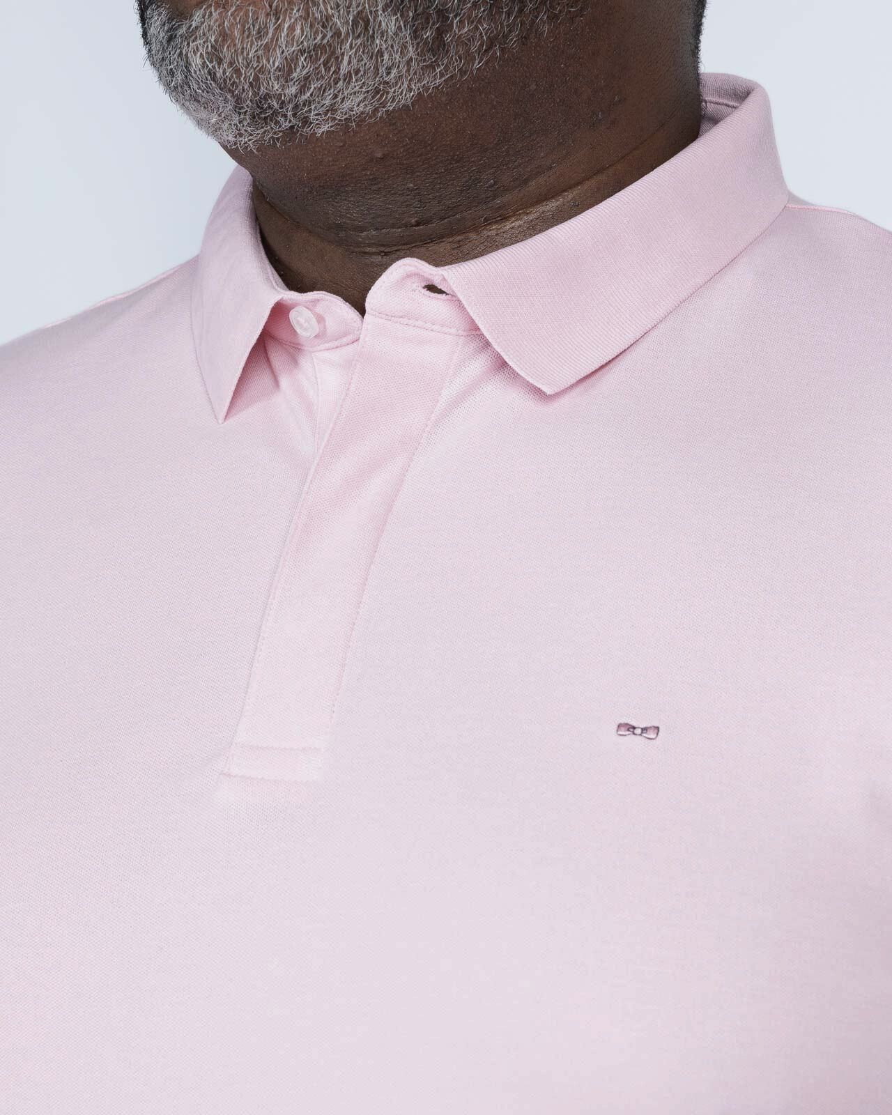 Polo uni grande taille rose