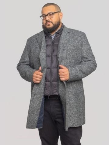 Look veste sans manche porté avec un manteau - Size Factory
